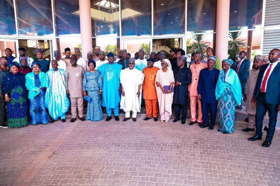 (Left) Honourable Minister of Humanitarian Affairs and Poverty Reduction, Professor Nentawe Goshwe Yilwstda, (middle) Honourable Minister of State, Dr. Yusuf Tanko Sununu, (Right) Permanent Secretary of the Ministry, Abel O. Enitan and Directors, Heads of agencies and Staff of the Ministry during the welcome reception of the two Ministers held in the Ministry's Headquarters, Federal Secretariat, Abuja.