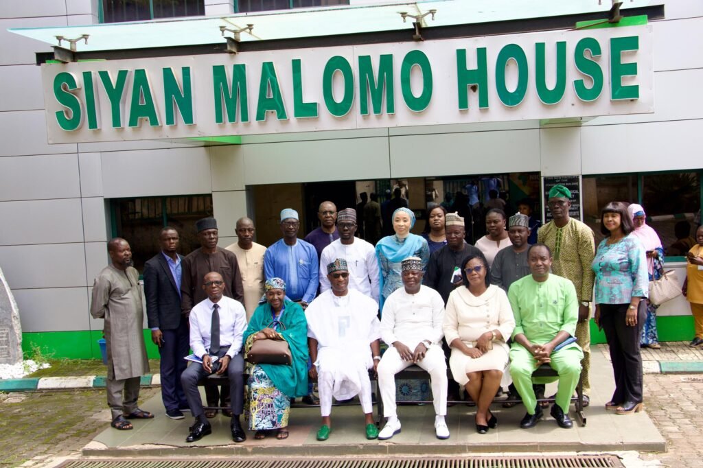 The Executive Director, NIWRMC, Dr. Abdulmumini Aminu Zaria (3rd L) and The Director General, NGSA, Professor Olusegun Omoniyi Ige (3rd R) with staff of both organisations in a group picture in Abuja 